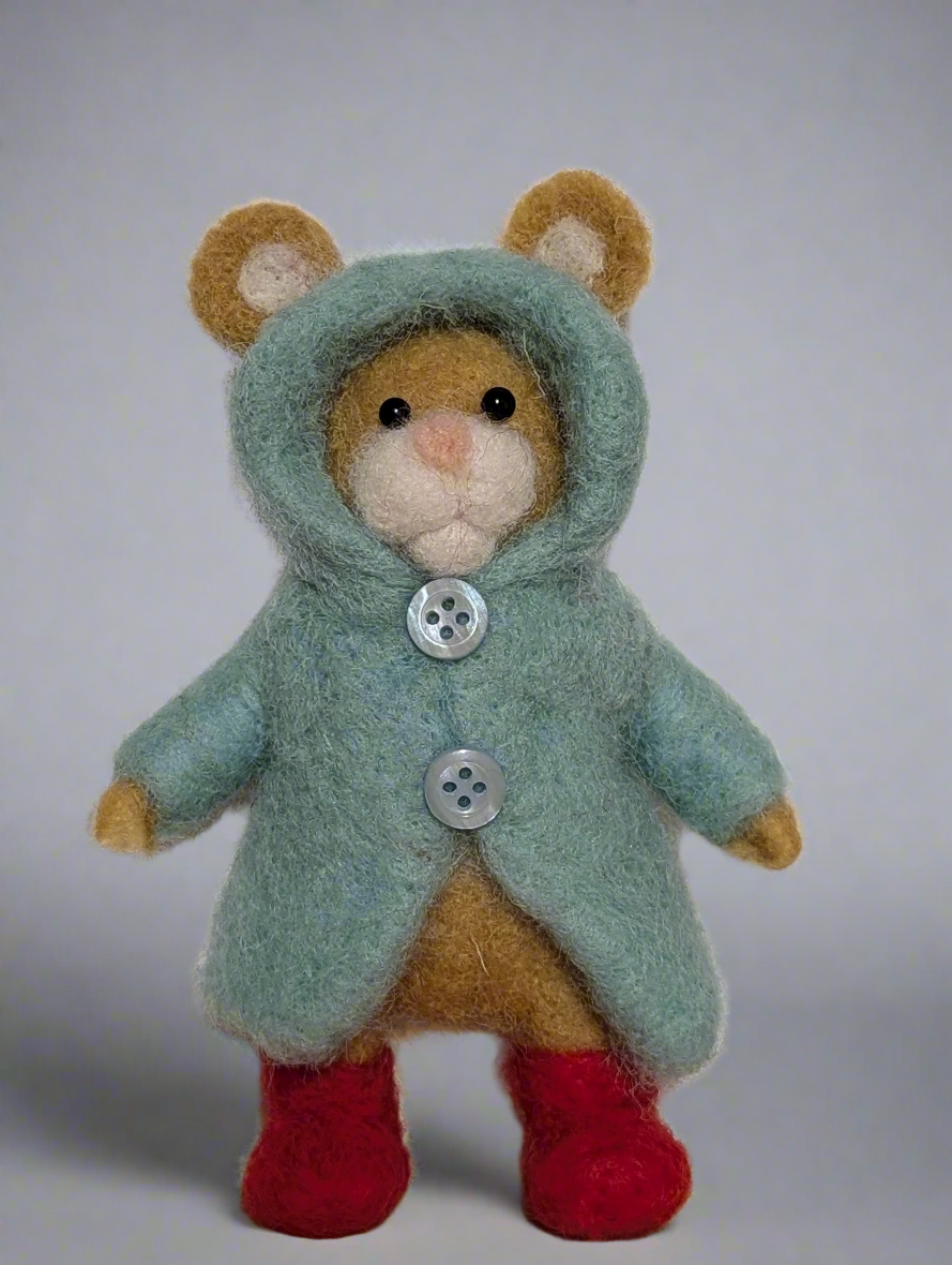 Little mouse in a raincoat